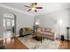 Cozy living room featuring a comfortable sofa, stylish decor, and an open layout at 164 Singleton Rd, Mooresville, NC 28117