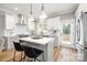 Contemporary kitchen with a center island, stainless appliances, and light gray cabinetry at 2003 Ashley Rd # B, Charlotte, NC 28208