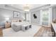 Spacious main bedroom suite featuring tray ceiling, soft neutral colors, and natural light at 2003 Ashley Rd # B, Charlotte, NC 28208