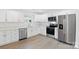 Bright kitchen with stainless steel appliances, white cabinets, and sleek countertops, perfect for cooking at 2416 Wendy Ln # 13, Gastonia, NC 28052