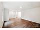 Spacious living room featuring neutral paint, and vinyl floors at 2416 Wendy Ln # 13, Gastonia, NC 28052