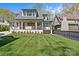 Charming two-story home with landscaped yard and a beautiful lawn at 2637 Normandy Rd, Charlotte, NC 28209