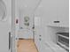 Walk-in pantry offers ample storage with custom cabinetry and a convenient beverage center at 2637 Normandy Rd, Charlotte, NC 28209