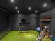 Indoor golf recreation room for practicing your drive year round at 2637 Normandy Rd, Charlotte, NC 28209