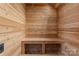 Sauna features wood paneling and bench seating at 2637 Normandy Rd, Charlotte, NC 28209