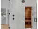 Modern shower with dual shower heads and adjacent sauna room at 2637 Normandy Rd, Charlotte, NC 28209