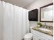 Bathroom featuring shower, vanity with granite countertop and dark wood medicine cabinet at 2719 Selwyn Ave # 3, Charlotte, NC 28209