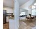 Open floorplan featuring a dining room that flows into a living room and kitchen with stainless steel appliances at 2719 Selwyn Ave # 3, Charlotte, NC 28209