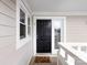 Front door of the unit with a black door, white trim, and unit number three at 2719 Selwyn Ave # 3, Charlotte, NC 28209