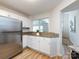 Open concept kitchen with stainless steel appliances, granite countertops, and hardwood floors at 2719 Selwyn Ave # 3, Charlotte, NC 28209