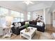 Airy living room featuring vaulted ceilings, open floor plan, and lots of natural light at 2719 Selwyn Ave # 3, Charlotte, NC 28209