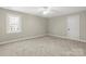 Neutral bedroom features plush carpet, window and door at 2840 Wheatfield Ct, Lincolnton, NC 28092