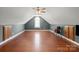 Bonus room features hardwood floors, vaulted ceilings, and a window seat at 2840 Wheatfield Ct, Lincolnton, NC 28092