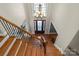 Elegant foyer showcasing a grand staircase and a beautiful chandelier above the front door at 2840 Wheatfield Ct, Lincolnton, NC 28092