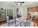 Bright home office features built-in shelving, french doors and a cozy atmosphere for productivity at 2840 Wheatfield Ct, Lincolnton, NC 28092
