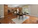 Kitchen with hardwood flooring, an island with seating, and direct access to an outdoor space at 2840 Wheatfield Ct, Lincolnton, NC 28092