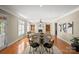 Open-concept home with hardwood flooring, a fireplace, and stylish seating in the combined living area at 2840 Wheatfield Ct, Lincolnton, NC 28092