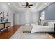 Spacious main bedroom featuring hardwood floors, ceiling fan, and ample natural light at 2840 Wheatfield Ct, Lincolnton, NC 28092