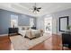 Spacious main bedroom with hardwood floors, tray ceiling and ensuite bathroom access at 2840 Wheatfield Ct, Lincolnton, NC 28092