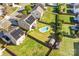 Aerial view of the property with solar panels, in-ground pool, fenced yard and shed at 3010 Berry Creek Rd, Charlotte, NC 28214