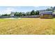 Large backyard featuring an in-ground kidney-shaped pool and storage shed at 3010 Berry Creek Rd, Charlotte, NC 28214