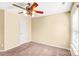 Bright bedroom with a ceiling fan and a single window, creating a comfortable and airy atmosphere at 3010 Berry Creek Rd, Charlotte, NC 28214