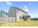 The home's exterior shows a fenced yard and screened in back porch at 3010 Berry Creek Rd, Charlotte, NC 28214