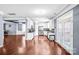 Bright kitchen featuring white cabinetry, stainless steel appliances, and granite countertops at 3010 Berry Creek Rd, Charlotte, NC 28214