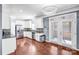 Modern kitchen showcasing stainless steel appliances and access to the backyard at 3010 Berry Creek Rd, Charlotte, NC 28214