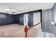 Open loft space with neutral carpet and plenty of natural light at 3010 Berry Creek Rd, Charlotte, NC 28214