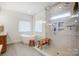 Bright bathroom with a walk-in shower, soaking tub, and tile flooring with modern fixtures at 317 Boyd Rd, Clover, SC 29710