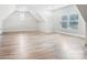 Spacious bonus room with hardwood floors and multiple windows offering natural light at 317 Boyd Rd, Clover, SC 29710