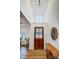 Grand foyer featuring a high ceiling, elegant chandelier, and stylish decor creating an inviting entrance at 317 Boyd Rd, Clover, SC 29710