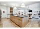 Spacious kitchen with a large island, modern appliances, and seamless access to the living area at 317 Boyd Rd, Clover, SC 29710