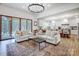 Elegant living room features large windows, hardwood floors, and an open layout perfect for entertaining at 317 Boyd Rd, Clover, SC 29710