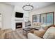 Cozy living room featuring a modern fireplace, TV, and comfortable seating area, great for relaxation at 317 Boyd Rd, Clover, SC 29710