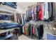 Walk-in closet featuring ample hanging space, shelving, and organized storage solutions for clothes and shoes at 3414 Chagall Ct, Charlotte, NC 28205