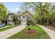 Well-kept townhome with neat landscaping and a lengthy driveway at 3414 Chagall Ct, Charlotte, NC 28205
