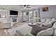 Cozy living room with electric fireplace, comfortable seating, and stylish decor at 34958 Lowder Rd, New London, NC 28127