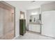 Bright bathroom featuring walk-in shower, white cabinets and granite countertops at 4004 Henshaw Rd # 448, Waxhaw, NC 28173