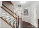 Welcoming entryway with stairs, wood flooring, and view of the front door at 4004 Henshaw Rd # 448, Waxhaw, NC 28173
