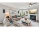 Inviting living room featuring a fireplace, ample natural light, and stylish neutral decor at 4004 Henshaw Rd # 448, Waxhaw, NC 28173