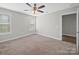 Neutral bedroom offers plush carpeting, great natural light and is move-in ready at 423 Pleasant Ave, Kannapolis, NC 28081