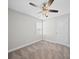 Comfortable bedroom featuring a ceiling fan, neutral walls and plush carpeting for a serene feel at 423 Pleasant Ave, Kannapolis, NC 28081