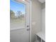 Close-up of a bright doorway with natural light, showcasing the bench and cubby storage area at 423 Pleasant Ave, Kannapolis, NC 28081