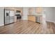 Modern kitchen with stainless steel appliances, granite counters, and light wood cabinets at 423 Pleasant Ave, Kannapolis, NC 28081