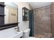 Stylish bathroom boasts a modern vanity and tiled shower stall with a sleek design at 4244 Donnybrook Pl, Charlotte, NC 28205