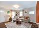 Cozy living room with comfortable seating, natural light, and a warm, welcoming atmosphere at 4244 Donnybrook Pl, Charlotte, NC 28205