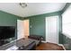 Well-lit home office with hardwood floors and plenty of storage space at 4244 Donnybrook Pl, Charlotte, NC 28205