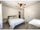 Bedroom featuring gray plank flooring, a queen size bed, and overhead lighting at 4285 Palmer Lloyd Rd, Lancaster, SC 29720